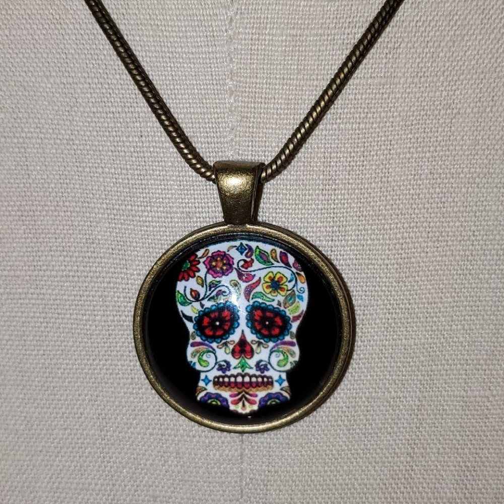 Handmade sugar skull necklace.
